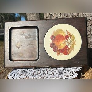 Vintage Wooden Charcuterie Tray with a Fruit Design potholder.